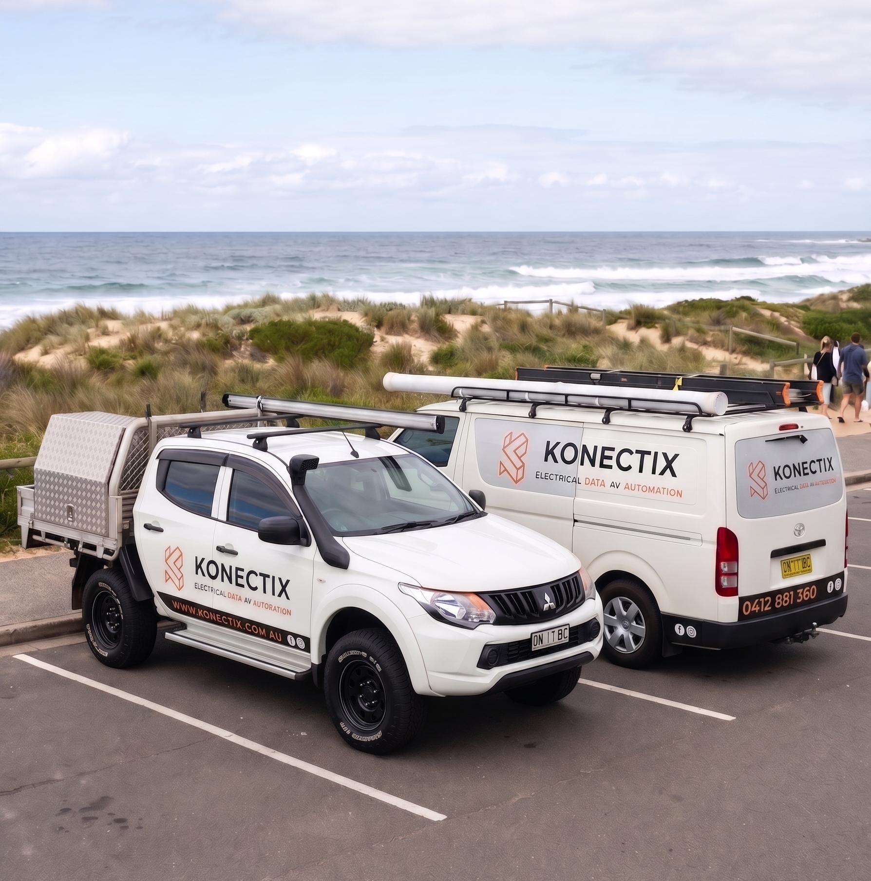 Konectix service vehicles parked beside the coast